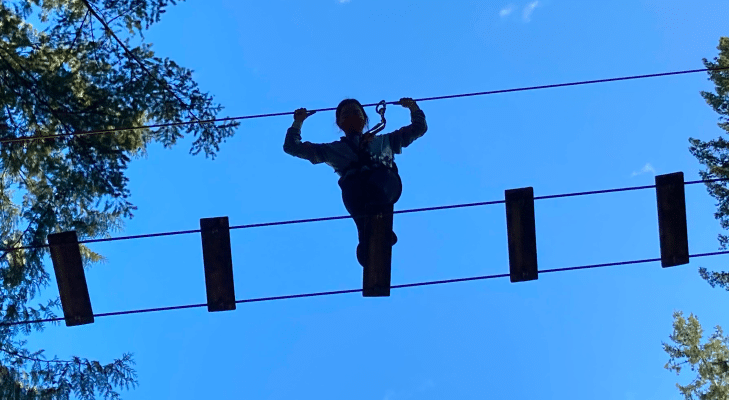 Girl Balancing at WildPlay (Feature Photo)