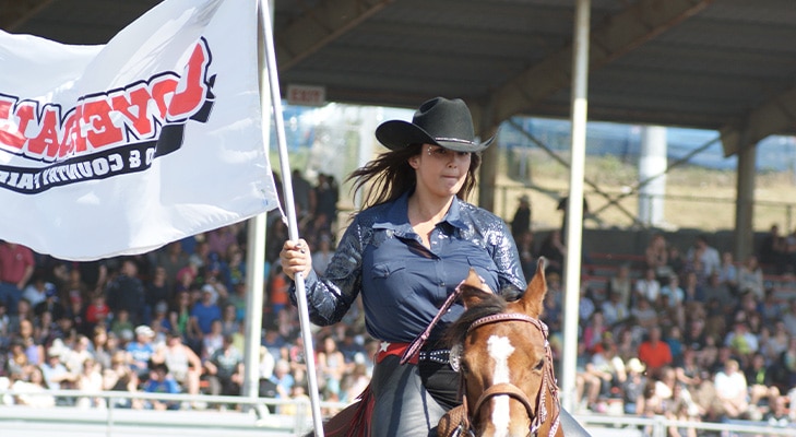 Cloverdale Rodeo Athlete with Flag